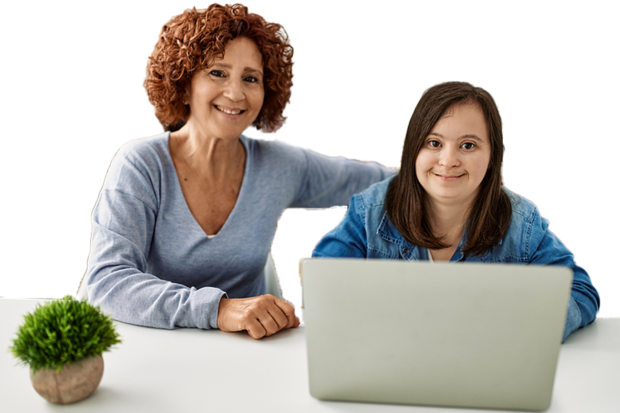 Woman and young lady looking at laptop